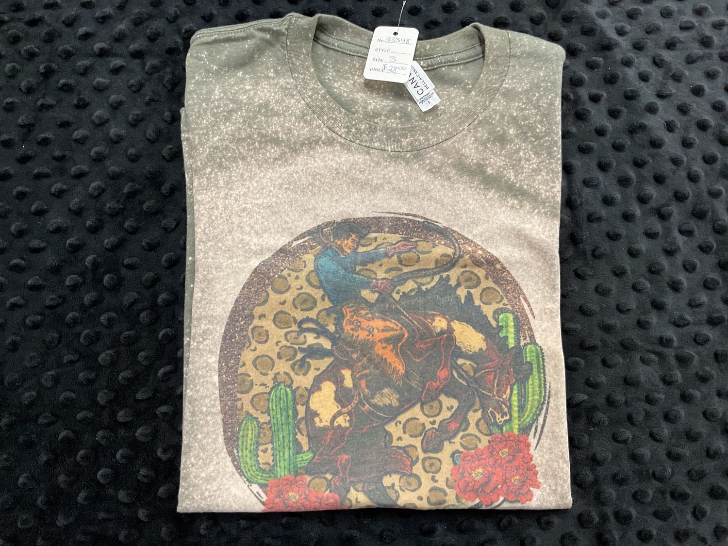 Cowboy riding green tee