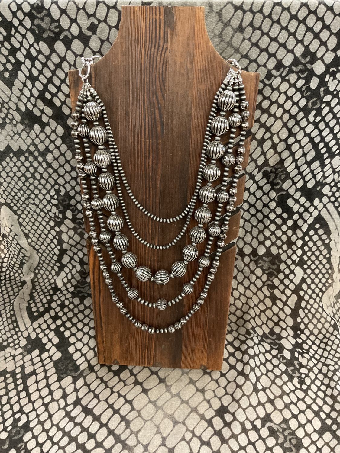 5 strand silver melon bead neck