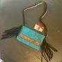 Justin clutch with crossbody strap tooled turquoise