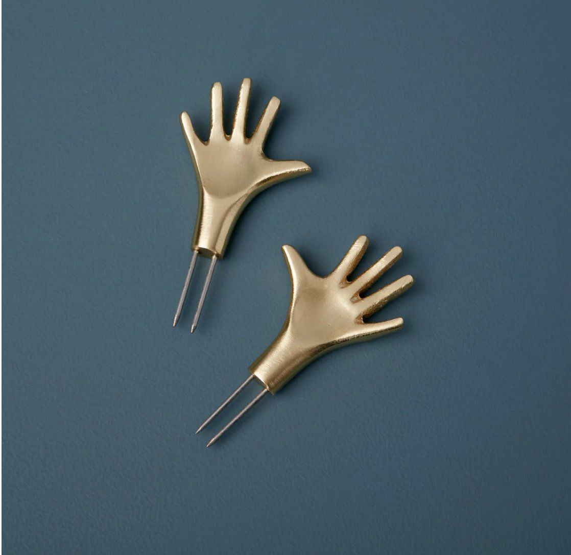 Gold Corn Holders, Hands