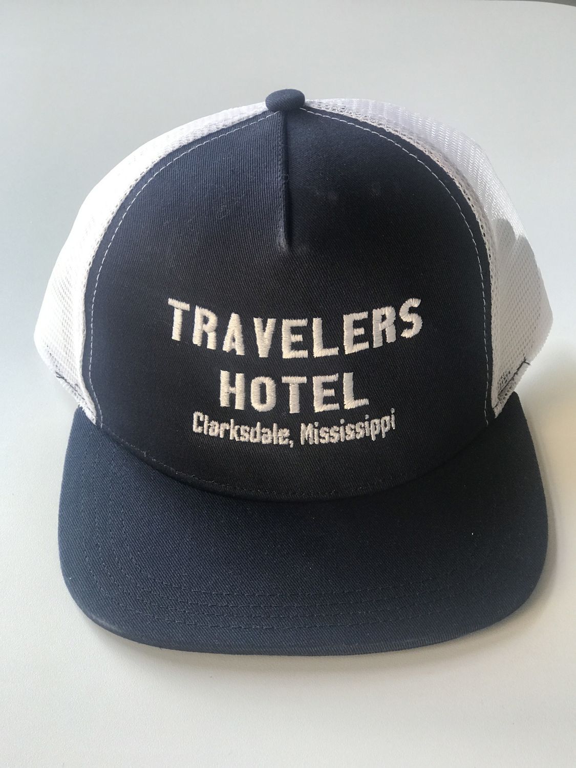 Travelers Hotel Trucker Hat