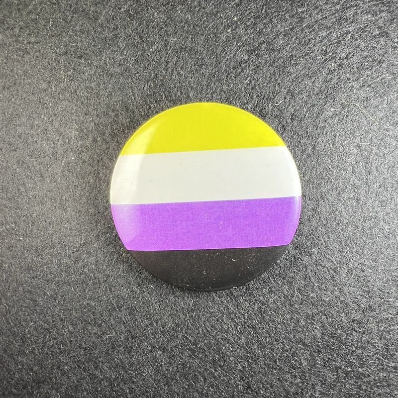 Round nonbinary pride macaron