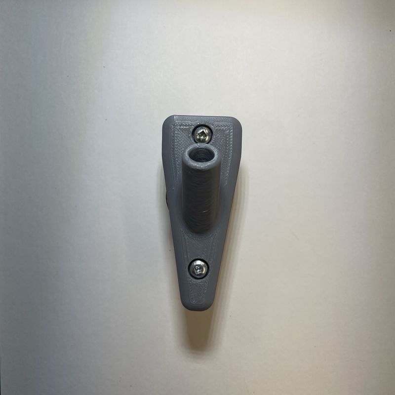 Black plastic 1-hole base for 12x18 flag to screw onto a wall