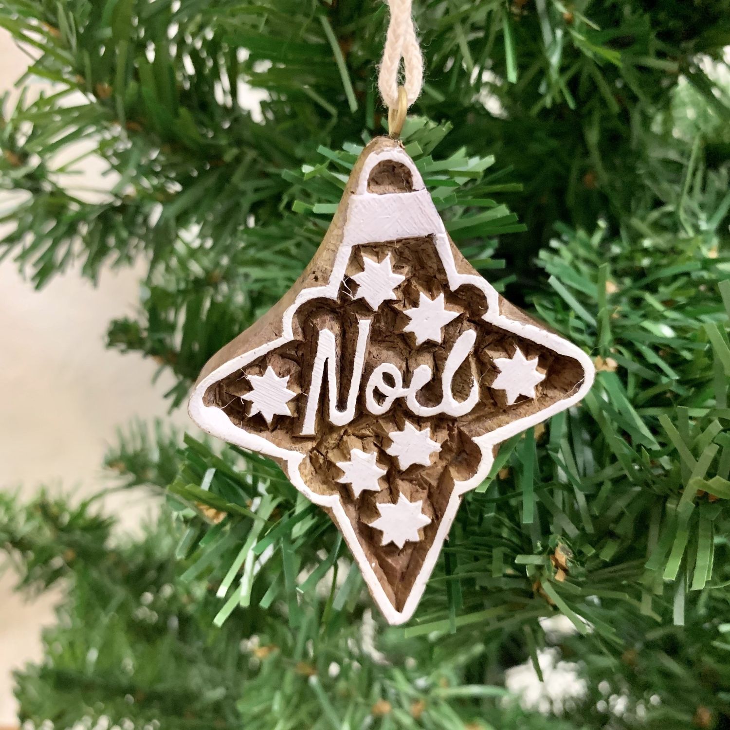 Wood Hima Bindu Word Ornament Noel