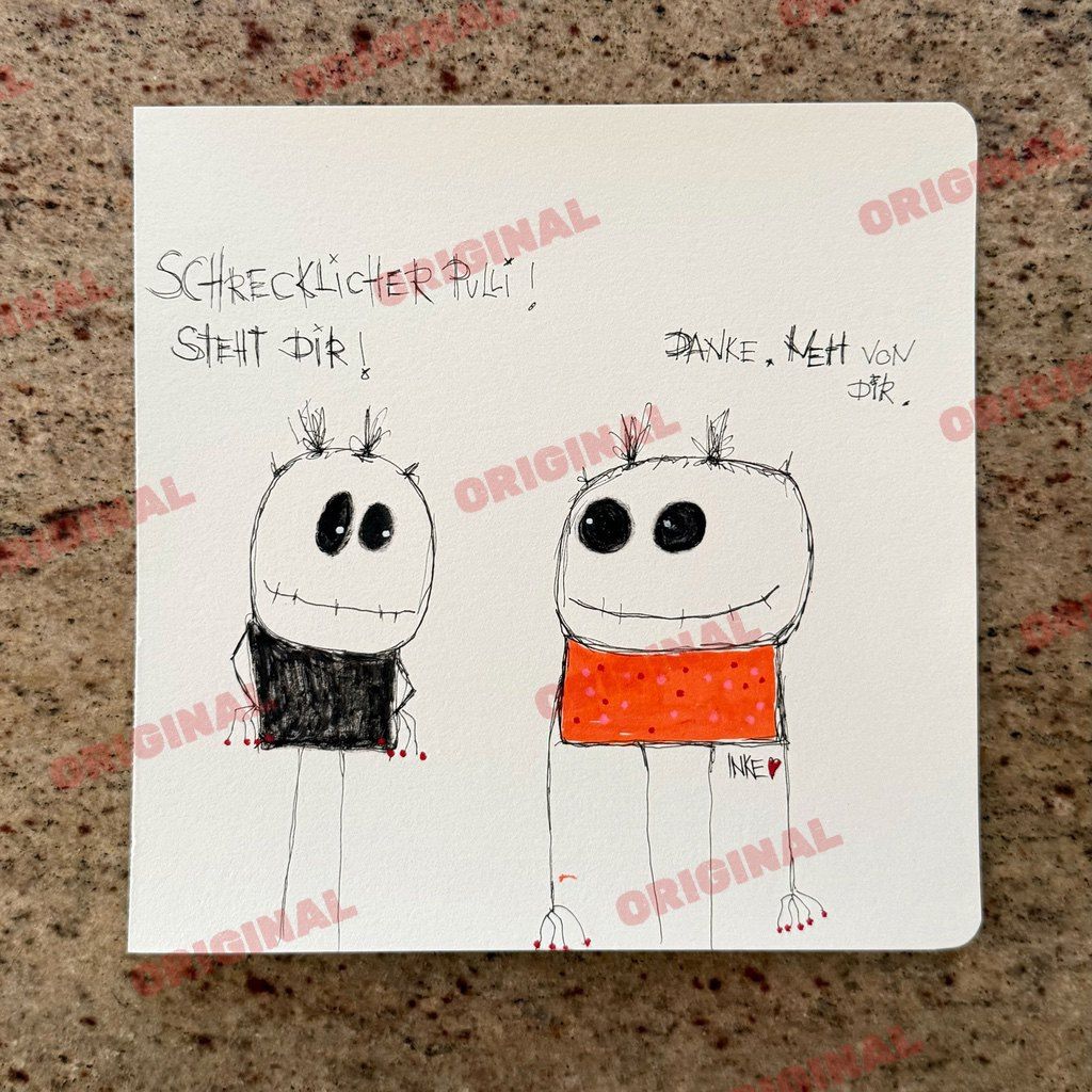 Schrecklicher Pulli! Steht Dir!