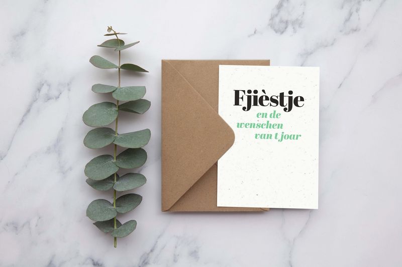 Wenskaart &quot;Fjièstje en de wenschen van &#39;t joar&quot;