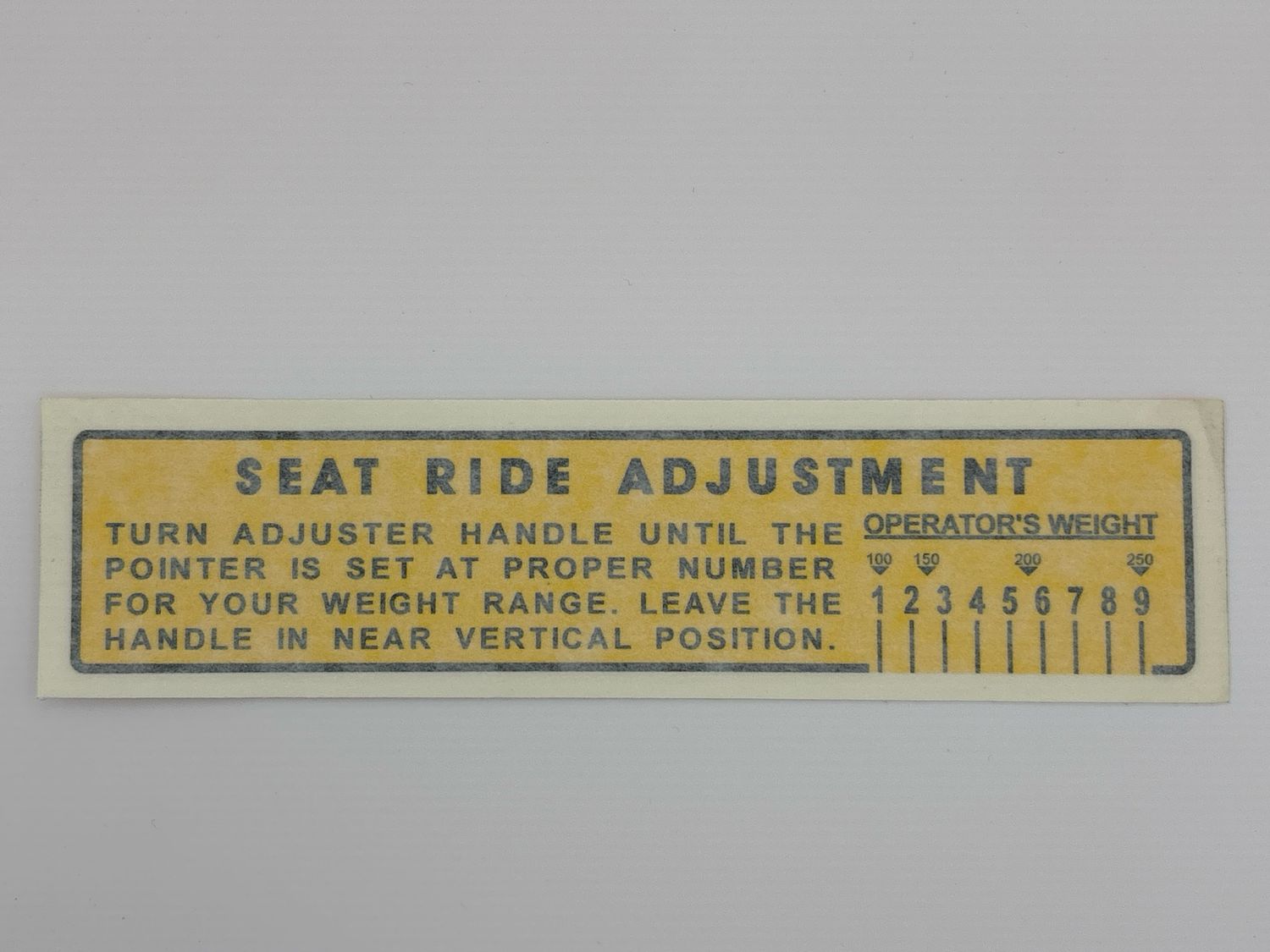 Seat Ride Adjustment Decal-Yellow