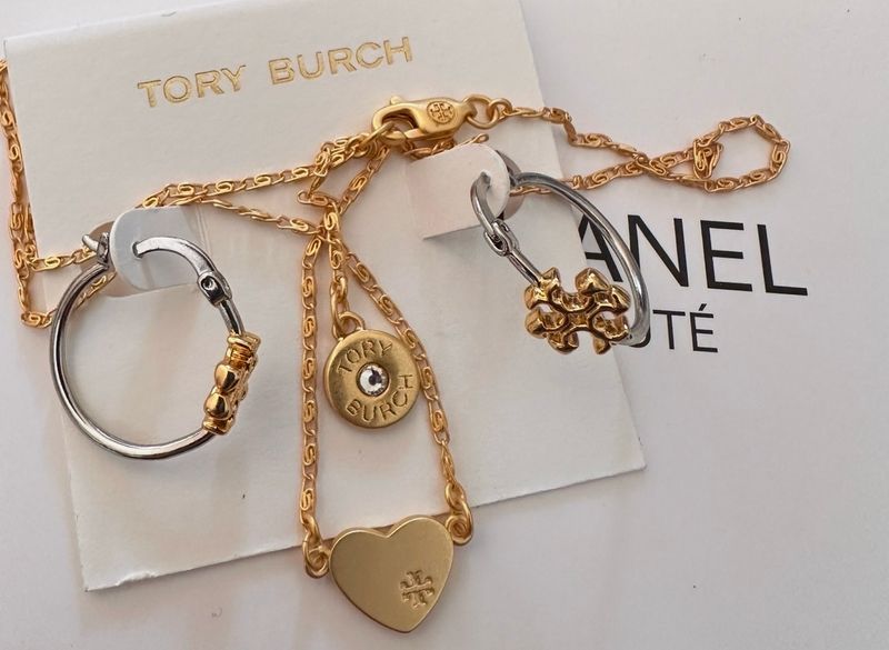 Tory Burch Jewelry Set • Gold-plated Brass Includes a Logo-Engraved Necklace with Heart &amp; Bullet-Style Charms &amp; Matching Hoop Earrings