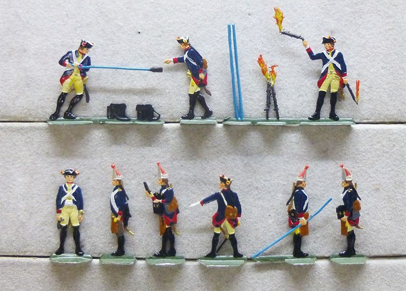 9 Zinnfiguren Preussen 1750 Bataillonsartillerie, Phase: Ladung Ansetzen