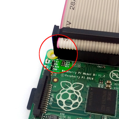 Connect the red stripe of the cable near to J8 mark on the board