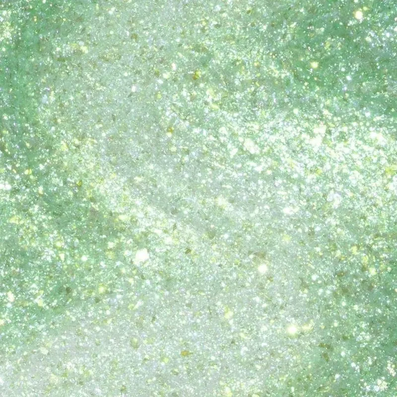 Green nail polish with a glitter finish, named Taurus-t Me. Perfect for a bold and festive look.