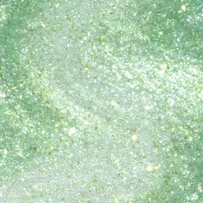 Groene nagellak met een glitterafwerking, genaamd Taurus-t Me. Perfect voor een opvallende en feestelijke uitstraling.