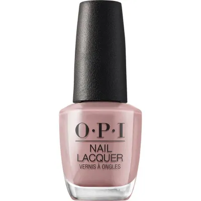 Nude, glossy, OPI nail polish “Somewhere Over the Rainbow Mountain” – soft glossy nude shade.