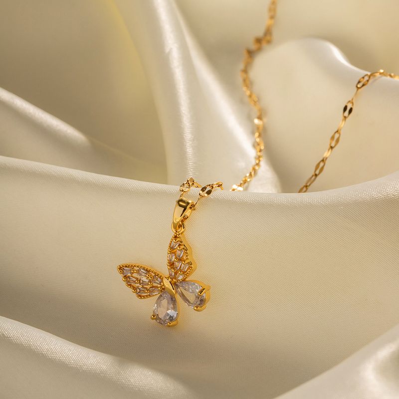 Collier à pendentif papillon en acier inoxydable en or 18 carats