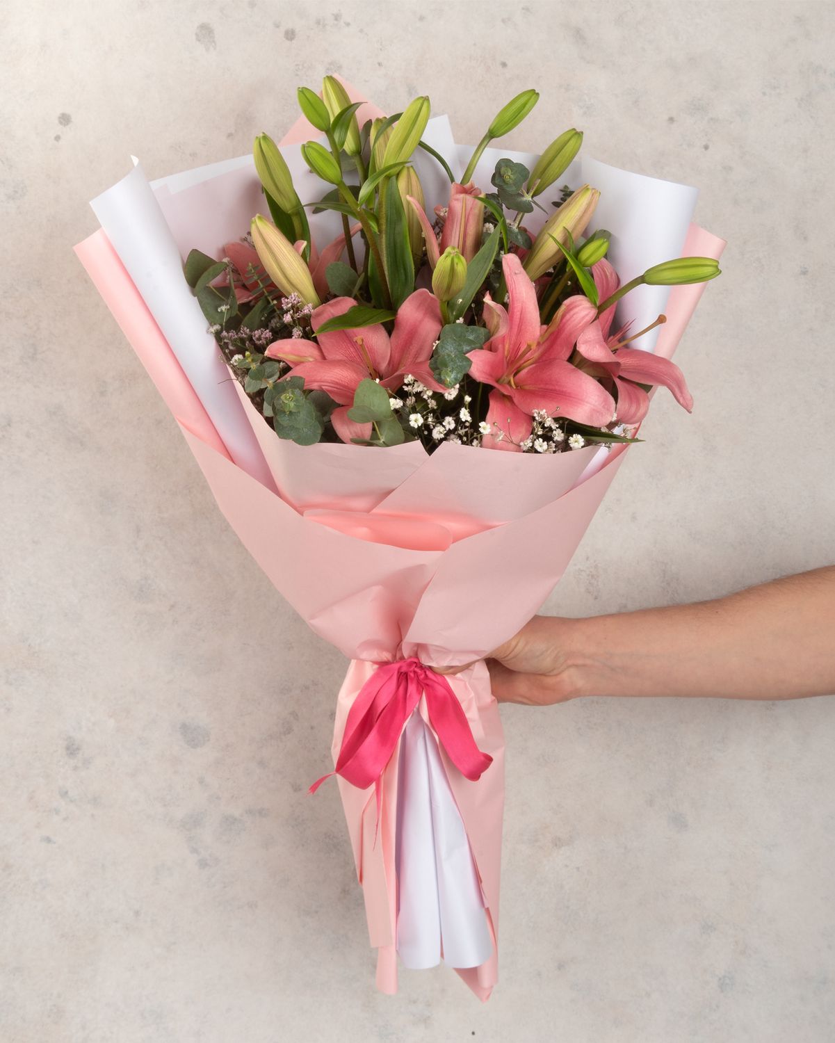 Lilies bouquet in soft pink and white tones, artisan design