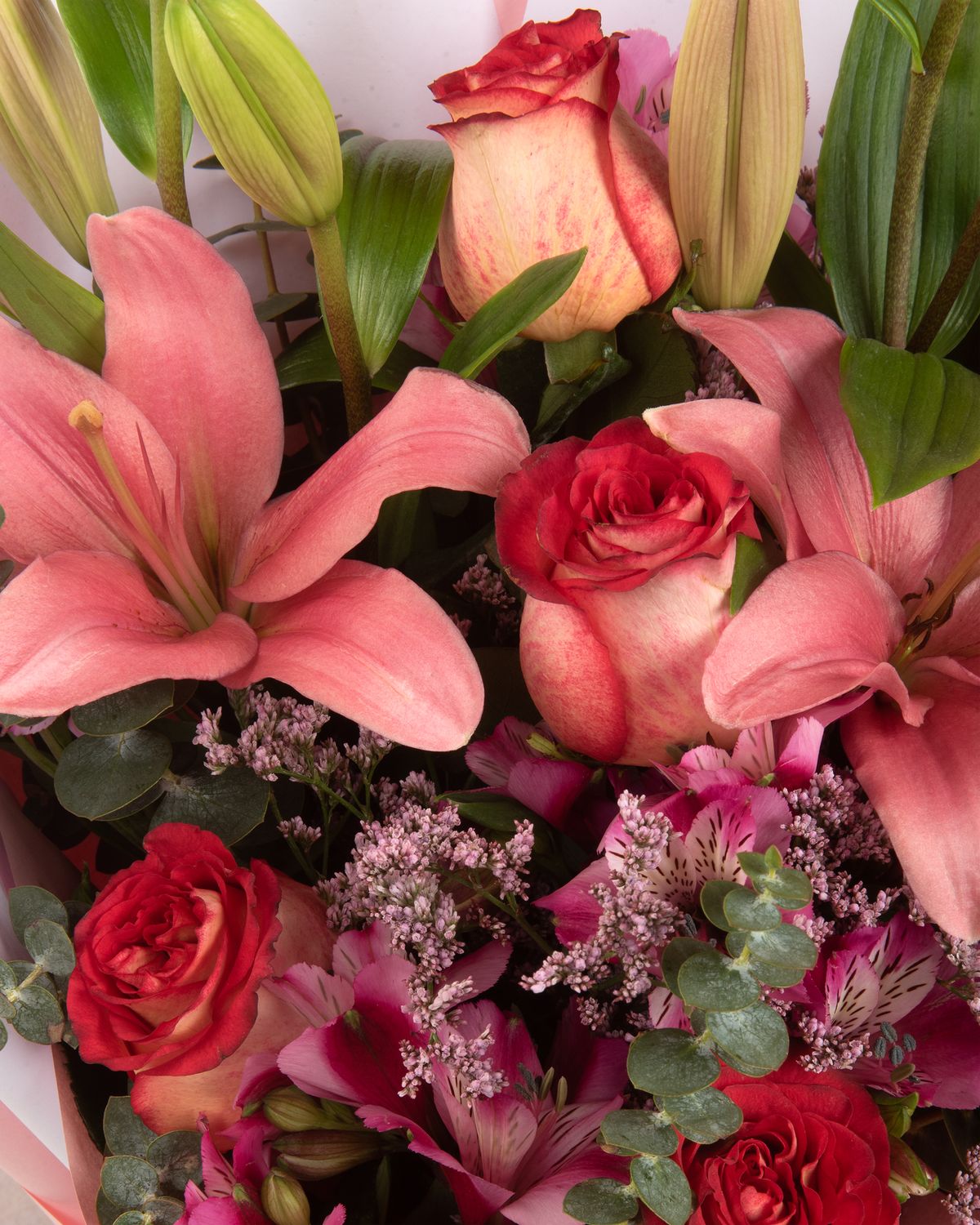 Bouquet of lilies, roses and alstroemerias.