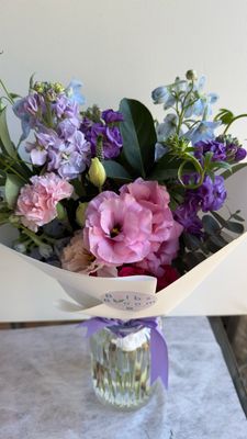 Mix Of Lisianthus And Stocks Flower Bouquet With Blue Delphiniums.