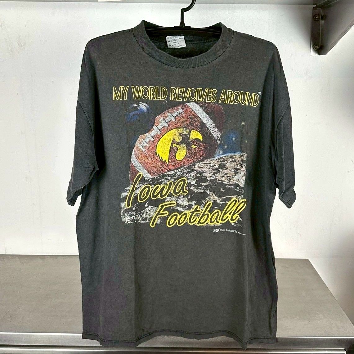 ​Vintage 90s Iowa Hawkeyes Football My World Revolves Around NCAA T-shirt
