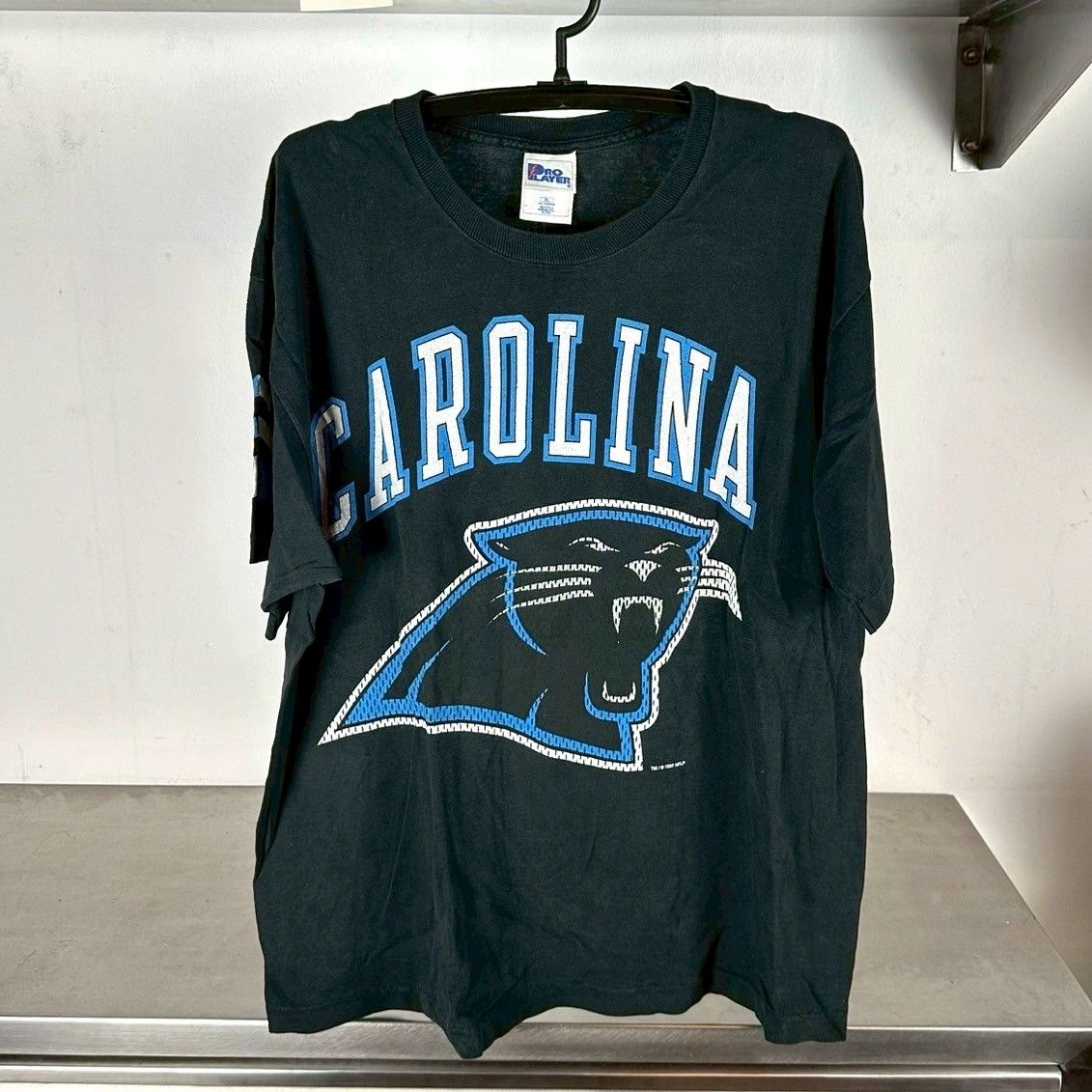 ​Vintage 1997 Carolina Panthers All Over Print NFL AOP T-shirt