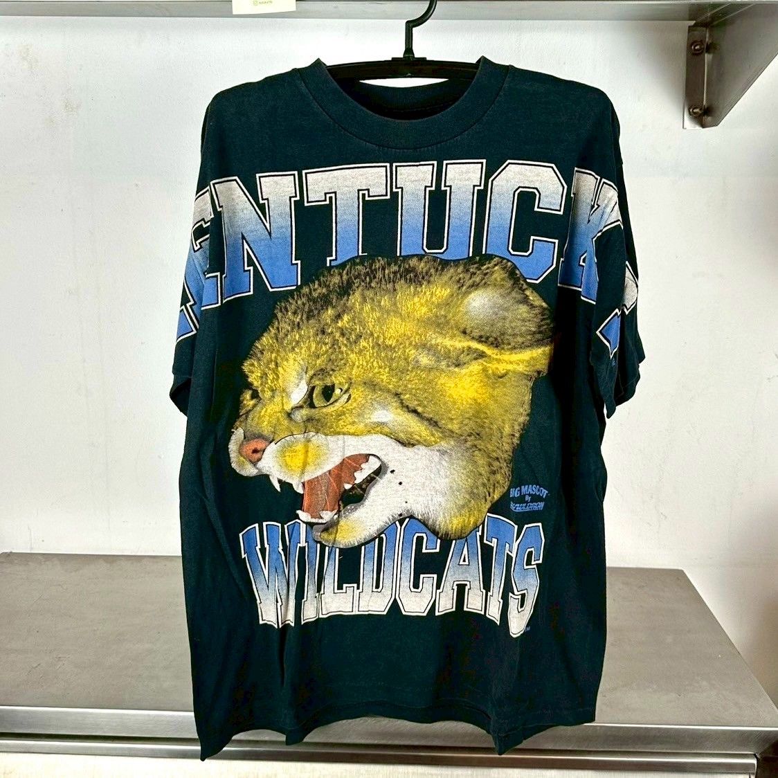 ​​​​​Vintage 90s Kentucky Wildcats Big Mascot Wauldron AOP NCAA T-shirt