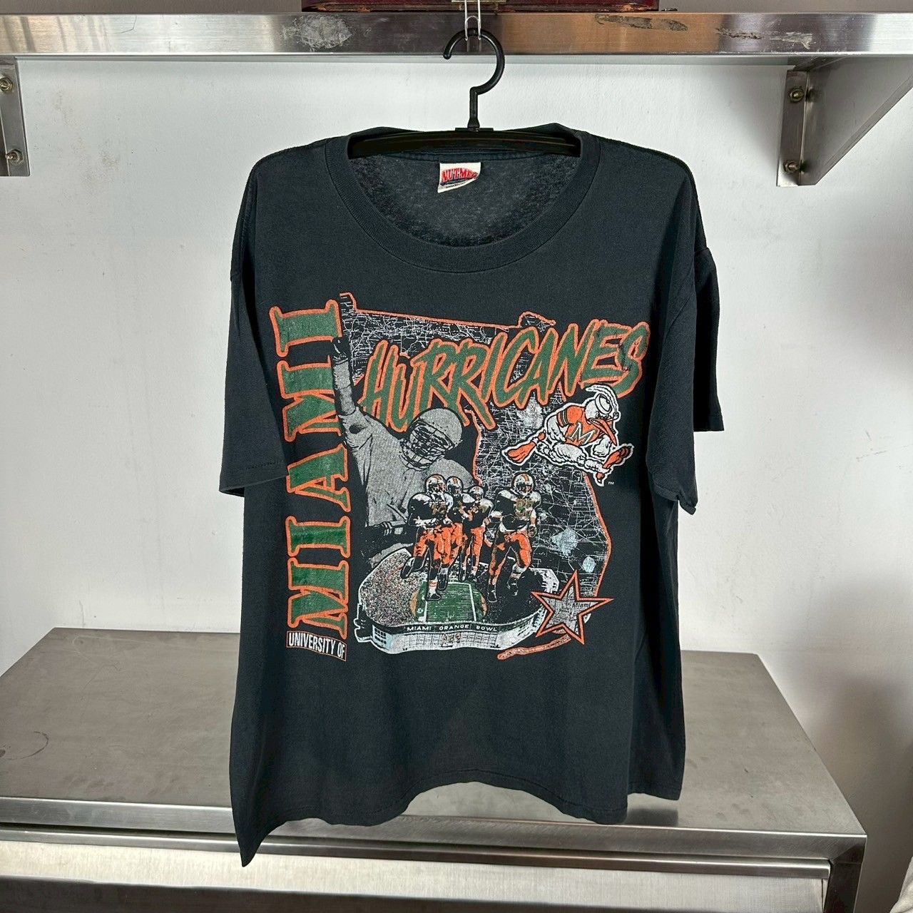 ​Vintage 90s Miami Hurricanes Football NCAA Nutmeg T-shirt