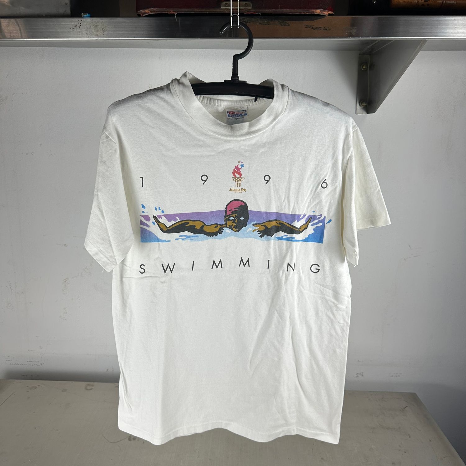 ​Vintage Atlanta 1996 Olympics Swimming Artwork Graphic T-Shirt