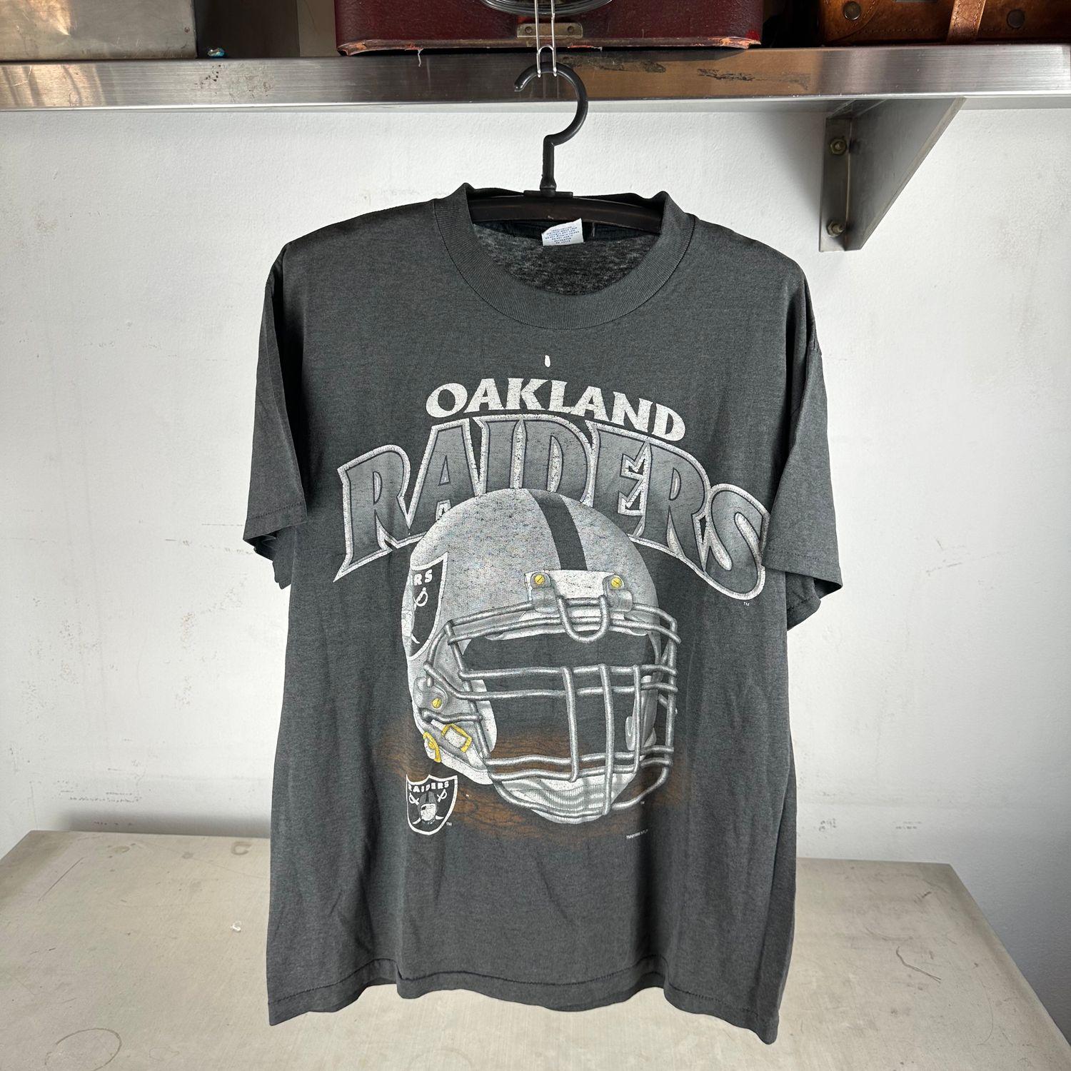 ​Vintage 1996 Oakland Raiders NFL Helmet Graphic T-Shirt