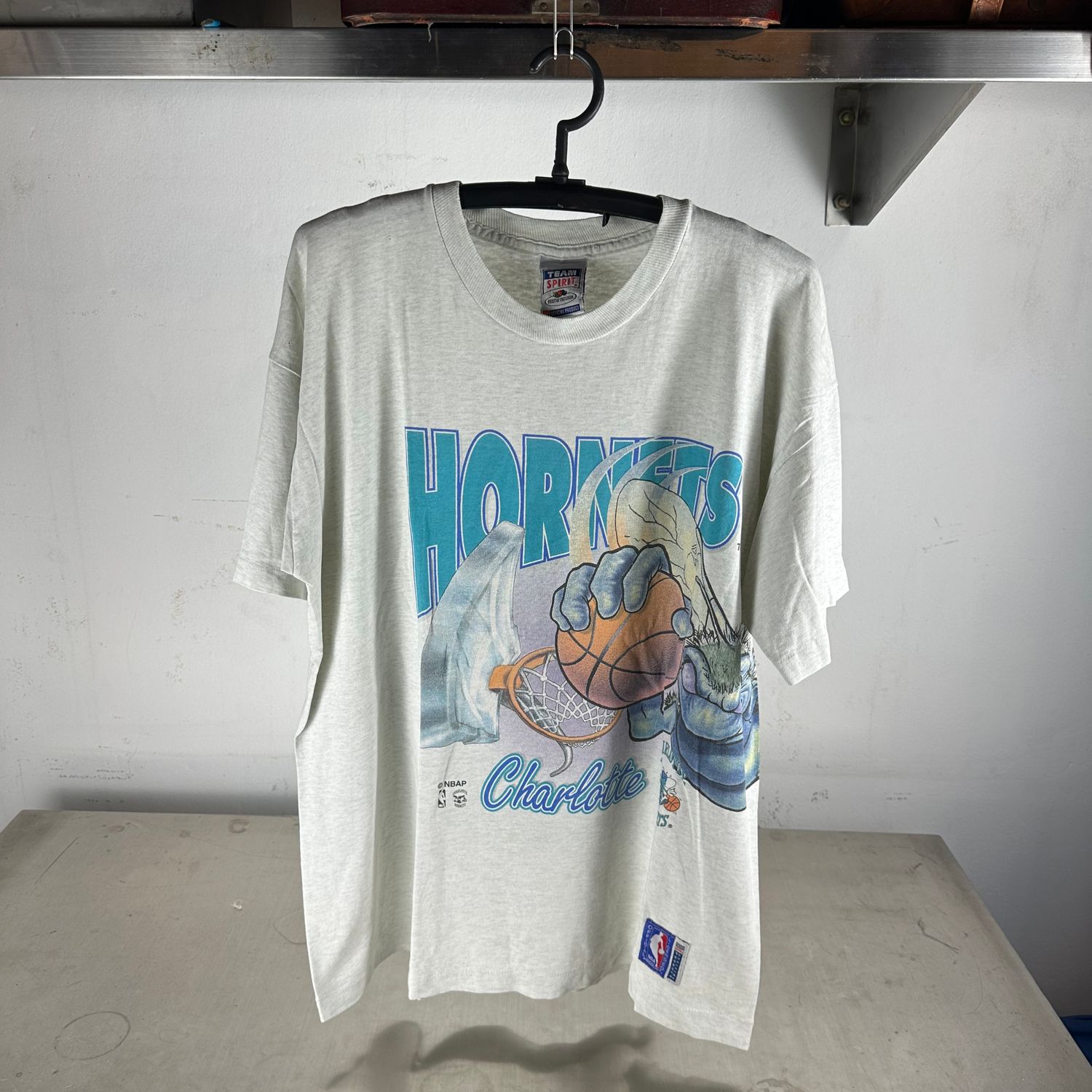 ​Vintage 90s Charlotte Hornets NBA Mascot Wraparound AOP T-Shirt