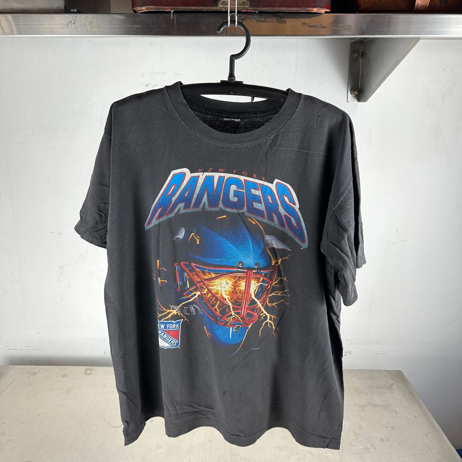 ​​​Vintage 90s New York Rangers NHL Lightning Helmet Graphic T-Shirt