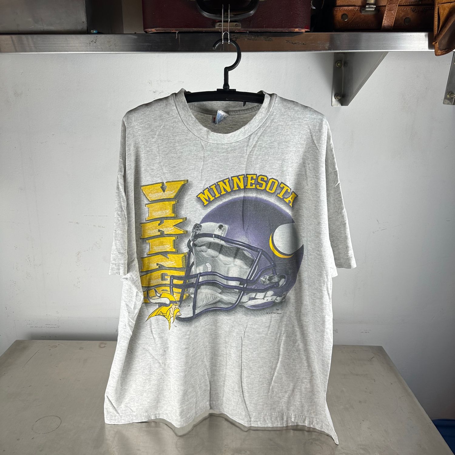 ​Vintage 1997 Minnesota Vikings NFL Helmet Graphic T-Shirt