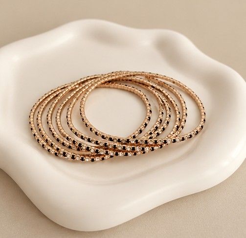 Bracelet Inès – Doré, strass noirs &amp; blancs