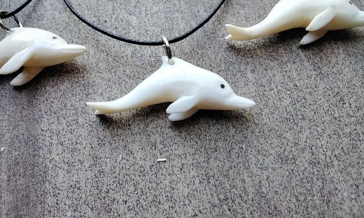 Dolphin Carved Necklace For 1 Moose Antler Carved Necklace Hand Carved in USA