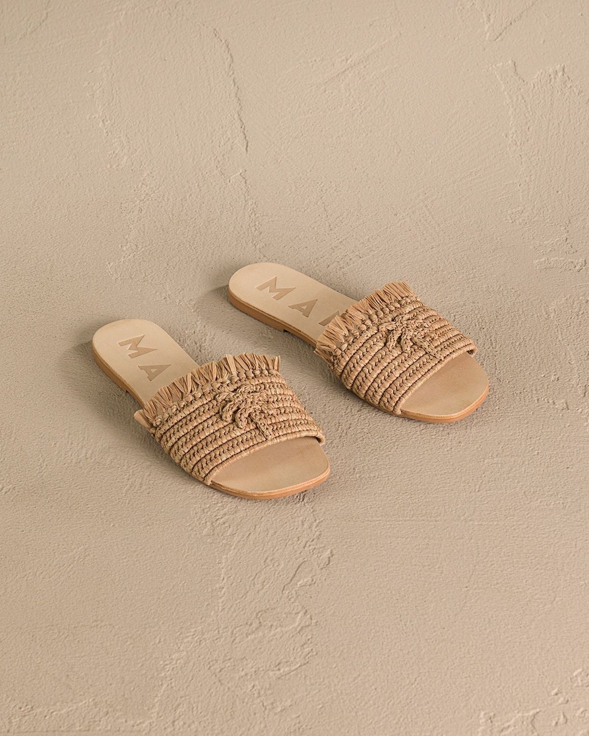 Manebi leather sandals tan with palm fringed knots raffia