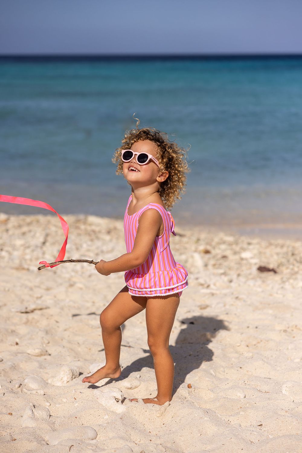 SNAPPER ROCK STRIPY SUNSET SUSTAINABLE SKIRT SWIMSUITPINK