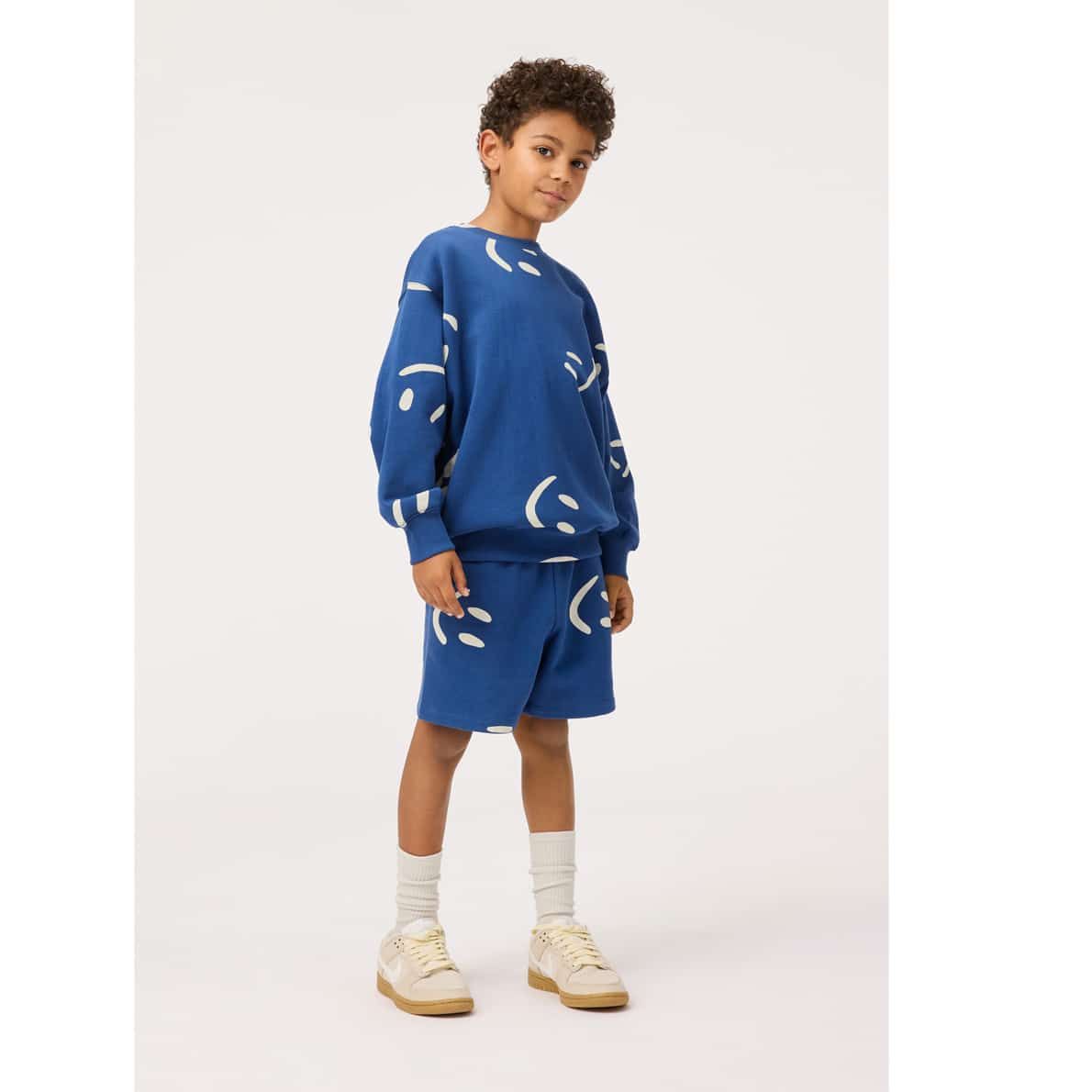 Molo Amil Big Smiles blue