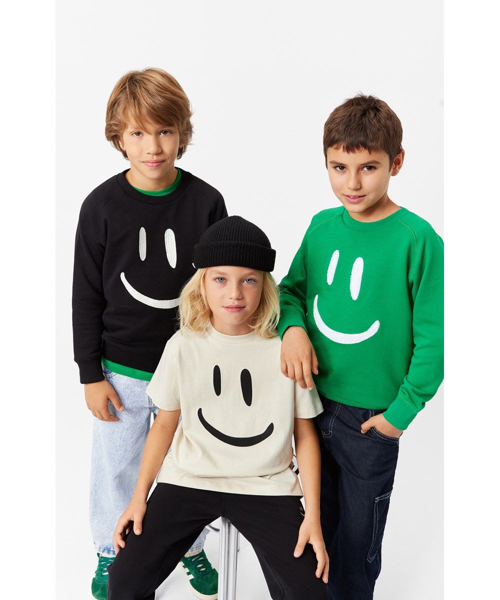 Molo Roxo White Noise Smile