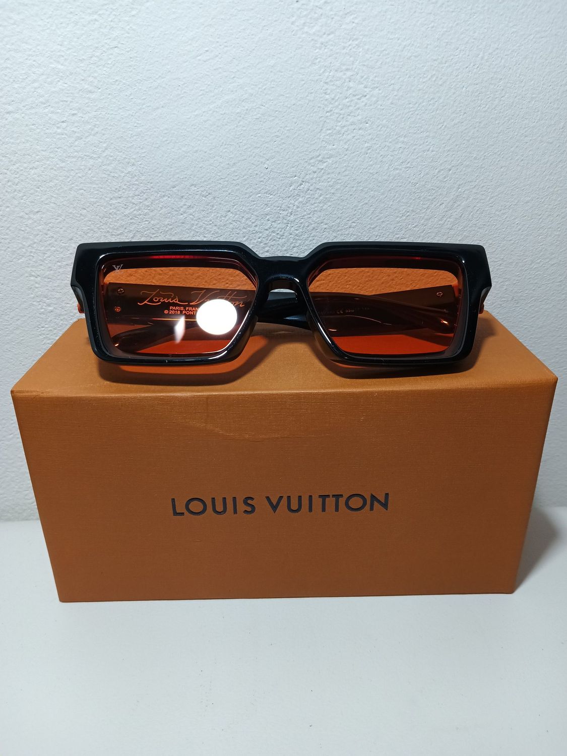 LV.