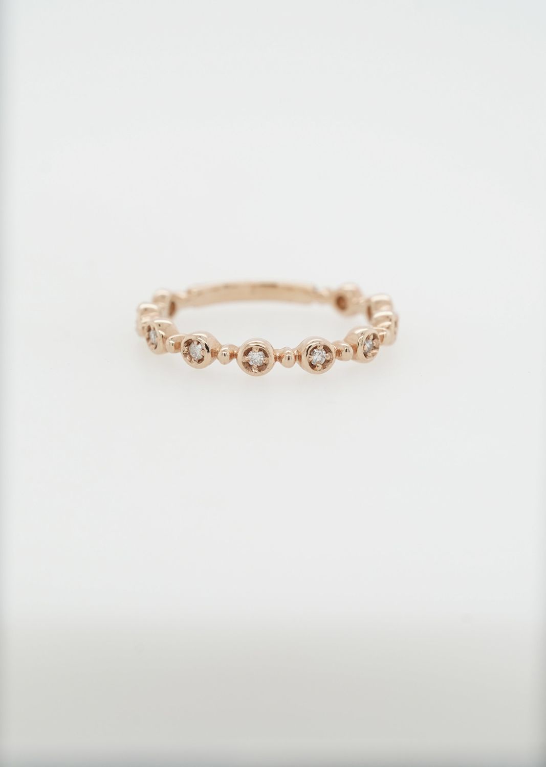 14KR 2.3g .09ctw Diamond Stackable Band (size 7)