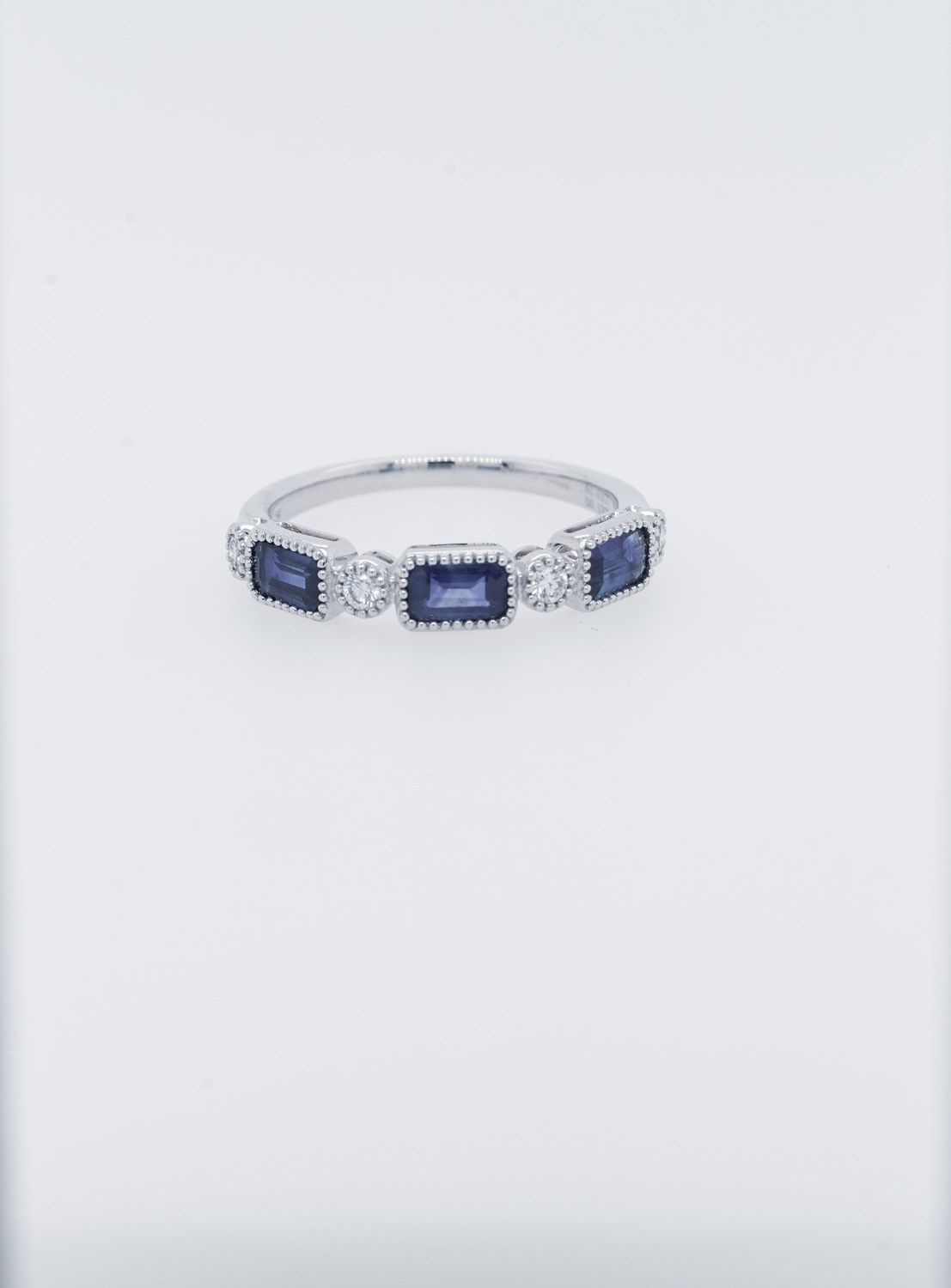 RVAX-18KW 2.6g .12ctw Diamond 1.01ctw Sapphire Stackable Band (size 6.5)