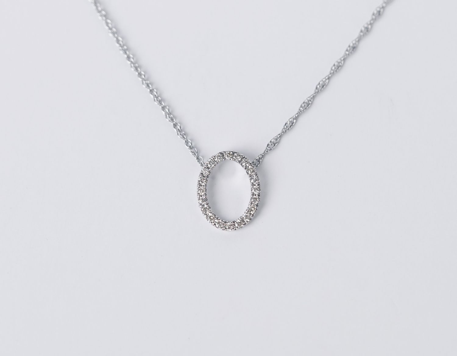 VLT-10KW 1.1g .14ctw Small Diamond Circle Pendant 16&quot;