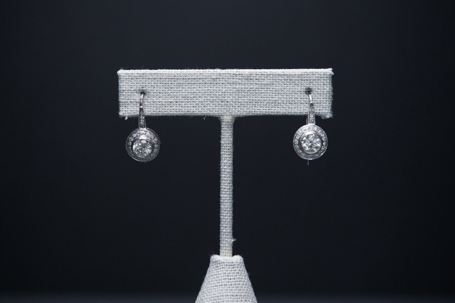 VVDT-14KW 3.79g 1.56ctw (1.36ctrs) Round Diamond Bezel Halo Earrings