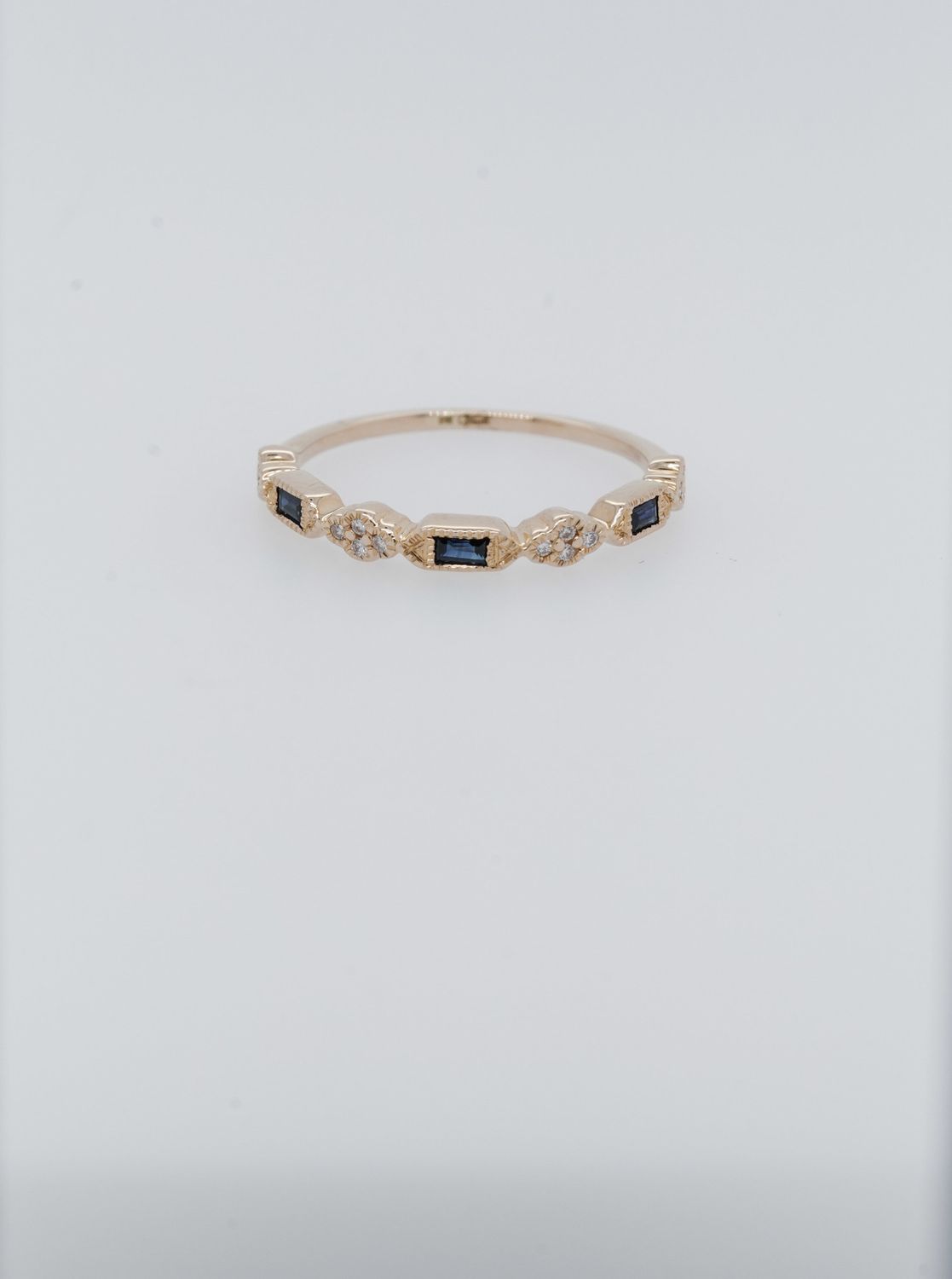 AVI- 14KY 1.34g .06ctw Diamond .015ctw Sapphire Stackable Band (size 6.5)