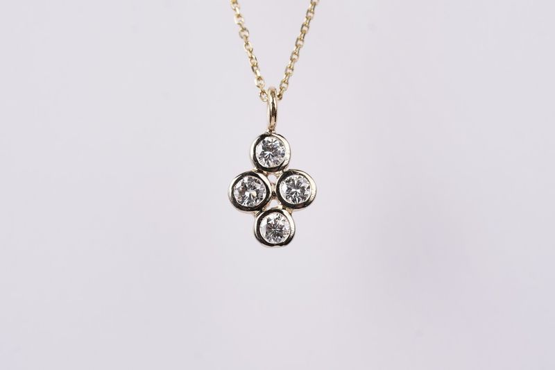ANTX-14KY 2.56g .50ctw Diamond Bezel Pendant 18&quot;