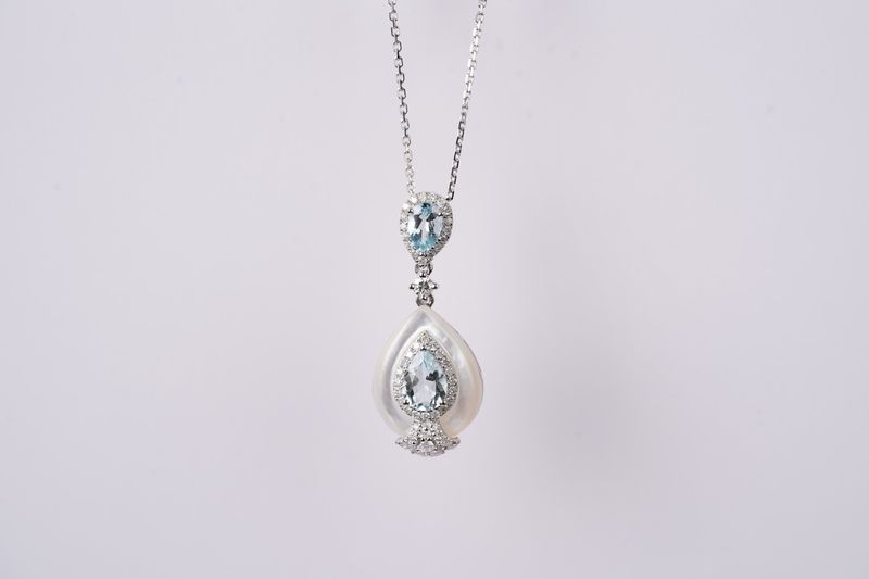 RTIX-14KW 2.13g .44ctw Diamond .92ctw Aquamarine/MOP Pendant 16-18"