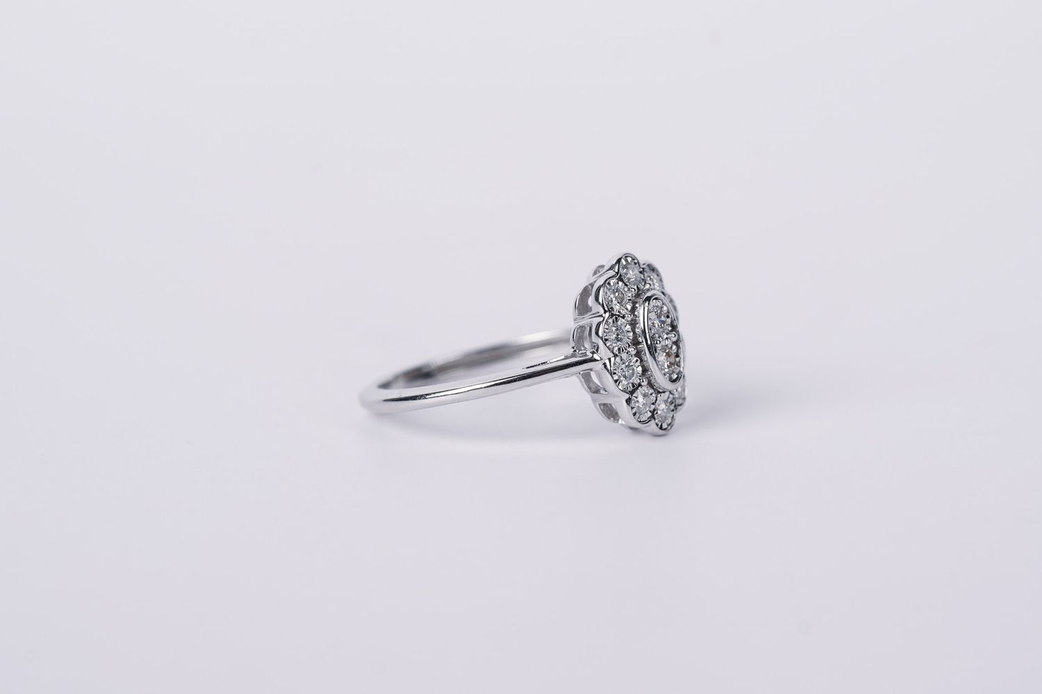 AAI-10KW 2.1g .25ctw Diamond Halo Fashion Ring (size 7)