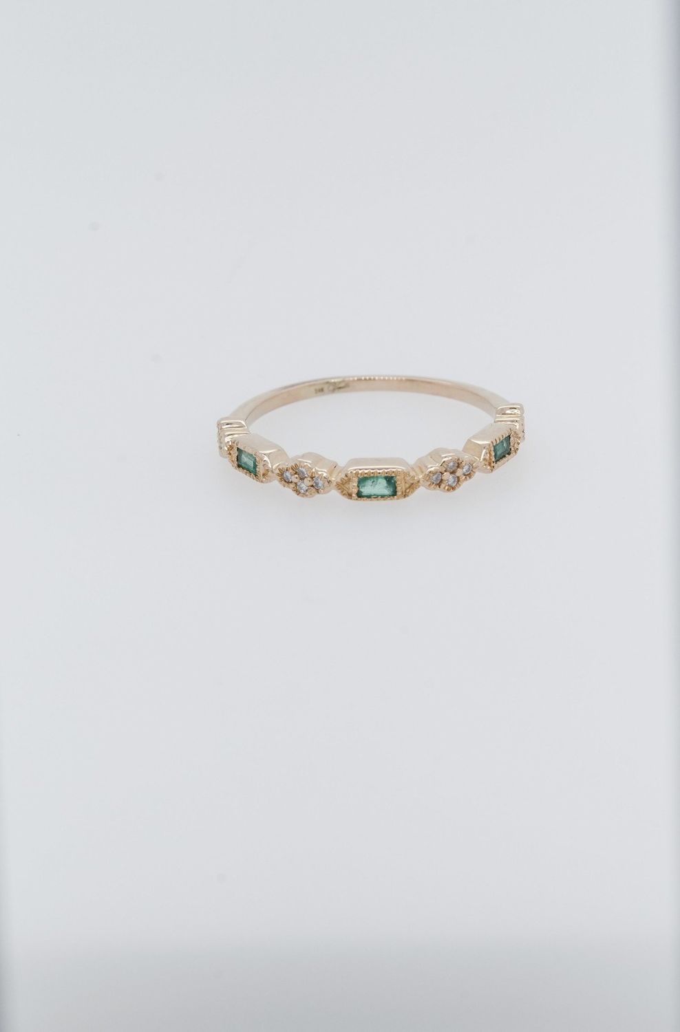 AVD- 14KY 1.44g .06ctw Diamond .14ctw Emerald Stackable Band (size 6.5)