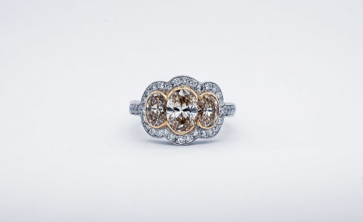 EETT- Platinum/ 18KY 11.38g 3.56ctw (1.40ctr) Fancy Yellow/SI2 Oval Three Stone Halo Engagement Ring (size 7)
