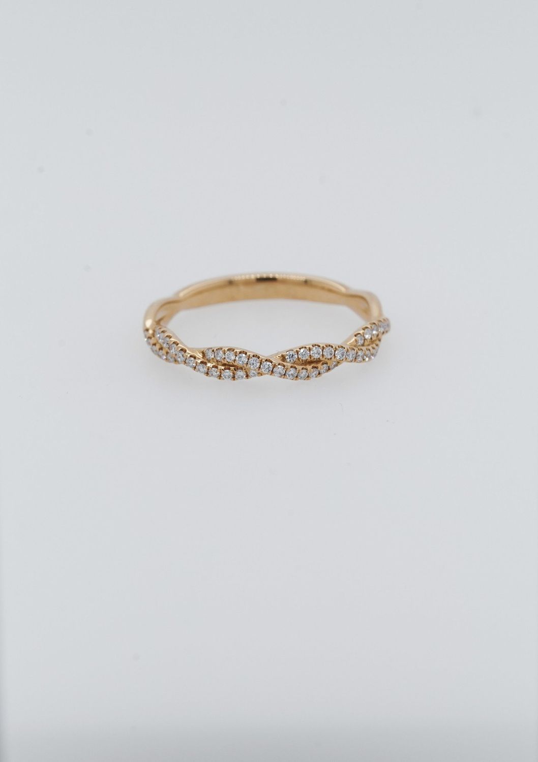 NAI 18KY 2.07g .18ctw Diamond Twist Stackable Band (size 6.75)