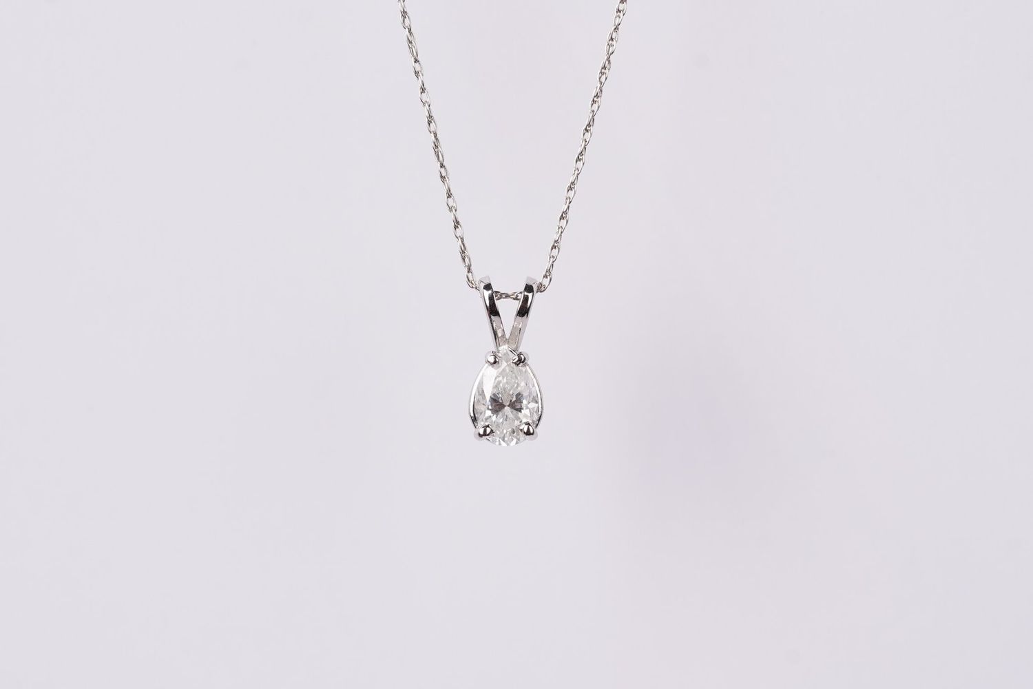 EVNX- 14KW 1.40g .53ct J/SI1 Pear Diamond Solitaire Necklace 18&quot;