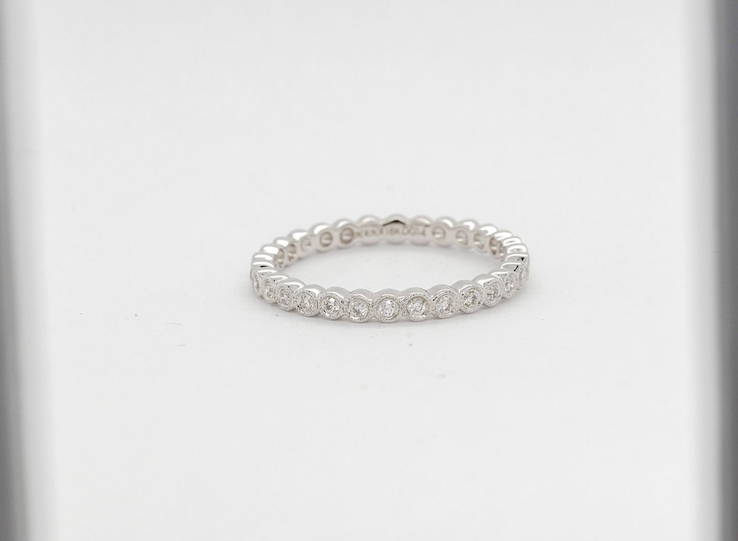 NET- 18KW 2.00g .14ctw Diamond Stackable Band (size 6.5)